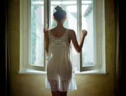 In the light of the open window