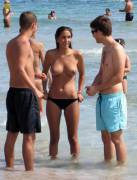 The most popular girl on the beach...I wonder why?
