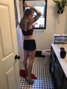 Ok here she is just 5 minutes ago getting ready for the day. I like catching her in her natural moments. Im going to post 3 pics of her that I just took minutes ago. Here she is putting on deodorant. I bought these shorts for her and she likes them. ????