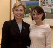 Natalie poking next to Hillary