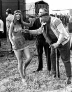 A livestock dealer checks out a hippie at the Egeskov Castle market, Denmark, July 1971