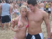 Blonde pulls her bikini aside