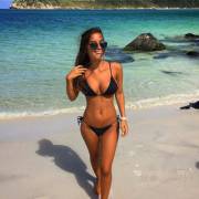 The wind is makin' a mess of her hair.