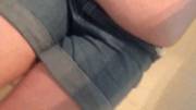 Wetting my denim shorts (f)