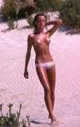 Topless tart with terrific tan