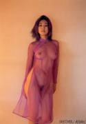 Vietnamese girl in sheer purple Ao Dai (x-post /r/AoDai)