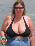 Huge milkers in a black bikini