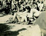 13 pics of vintage girl-on-girl sex show performed for soldiers