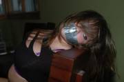 Cute teen tape gagged