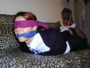 Hogtied and blindfolded