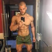 Muscles in the bathroom (X-Post /r/guysinshortshorts)