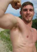Muscle jock showing his pits