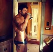 Having his morning coffee