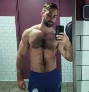 Showing his hairy chest