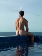 Sitting on the pools edge