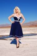 Classic sailor swing skirt with spaghetti straps. belt; bow; beautiful