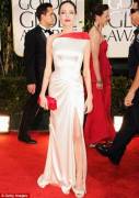 Angelina Jolie with red accents; in Atelier Versace