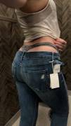 peeking out of brand new jeans