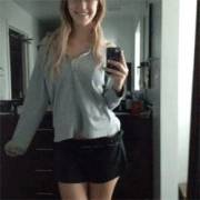 She drops the clothing and waits for the surprise