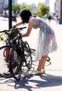 Locking up her bike