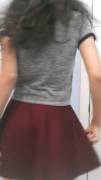 Lifting her skirt for our viewing pleasure [gif]