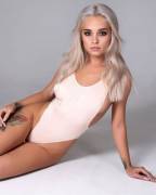 Lounging on her side