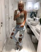 Blonde in, uh, what's left of her jeans