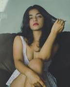 Playing with her hair