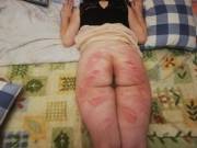 My M&M allowed me to post this photo as my first show-off in the mid of VERY first spanking; it was a hard lesson!