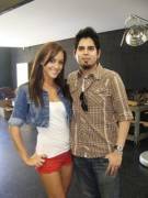 BTS with a fan at a Hot Shots Calendar shoot