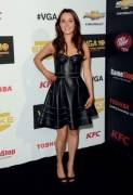 Camilla Luddington wearing a leather dress