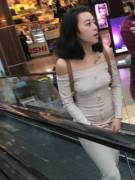 Tight dress and pierced nipples