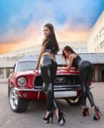 Mustang and two babes in shiny pants