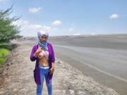 Hijabi Flashing on Beach