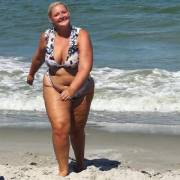 Allison Kimmey walking up the beach