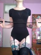 Black with garter and stockings covering tats.