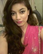 Indian hottie stripping down a sari.