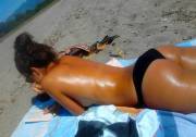 Sunbathing topless