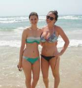 Small and big tits at the beach