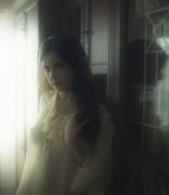 against the bookcase