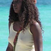 Her strap matches her hair piece.