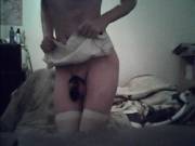 in my black cage, a skimpy lil apron, and thigh highs, i think it looks really cute :3