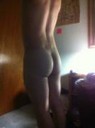 My boyfriend posing in front of my Skyrim map.