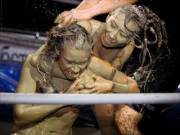 Woman mudwrestling