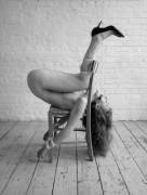 That's a unique way to use a chair.