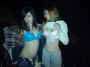 Flashing their bras