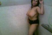 Chubby Chinese milf in the shower with big knockers.