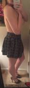 Grey peep toe heels, topless, and two short skirts