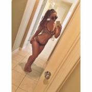 Proudly showing off her hips in her new bikini