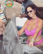 Ava meeting a dolphin